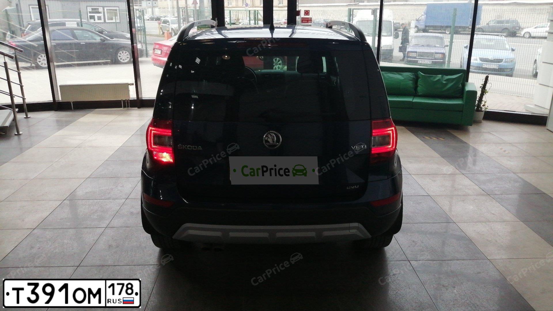 Фото автомобиля SKODA YETI, 2015 — госномер К970ОК198. Цвет: Темно-синий