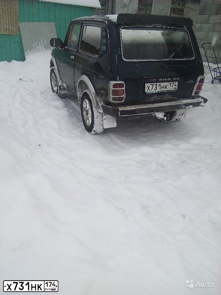 Фото автомобиля LADA 2121 NIVA, 1997 — госномер А564МТ702. Цвет: сине-зеленый
