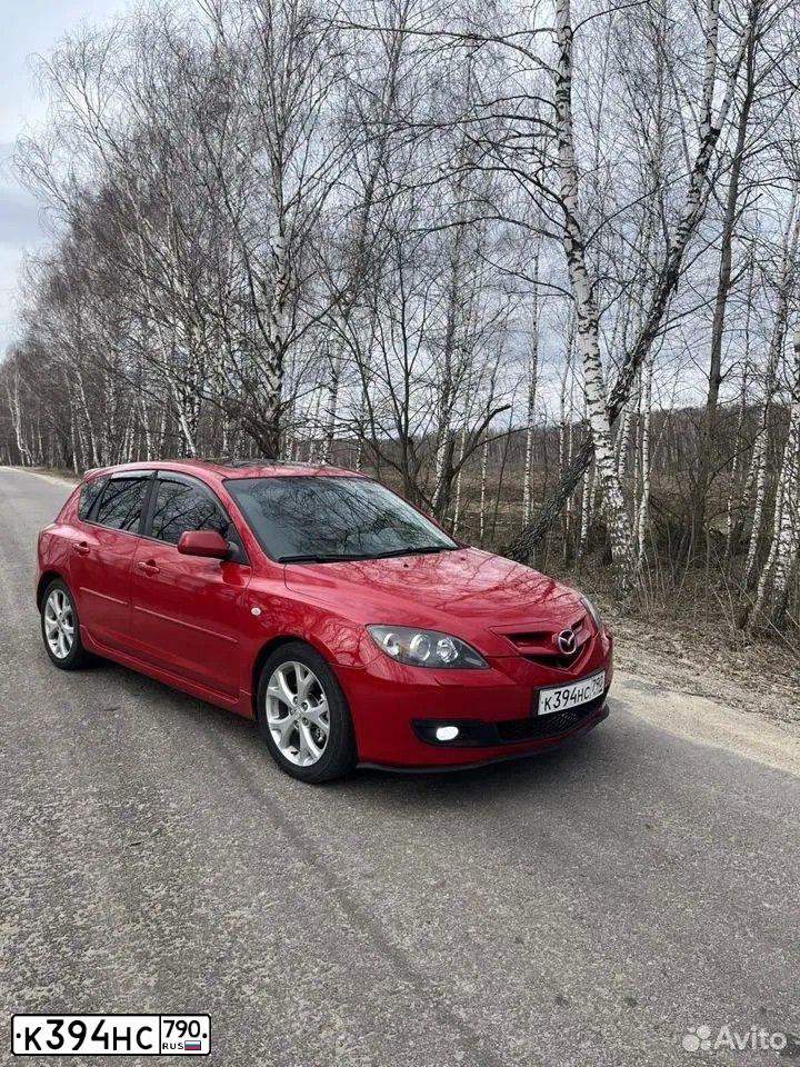 Фото автомобиля MAZDA 3, 2005 — госномер В400СК750. Цвет: Красный