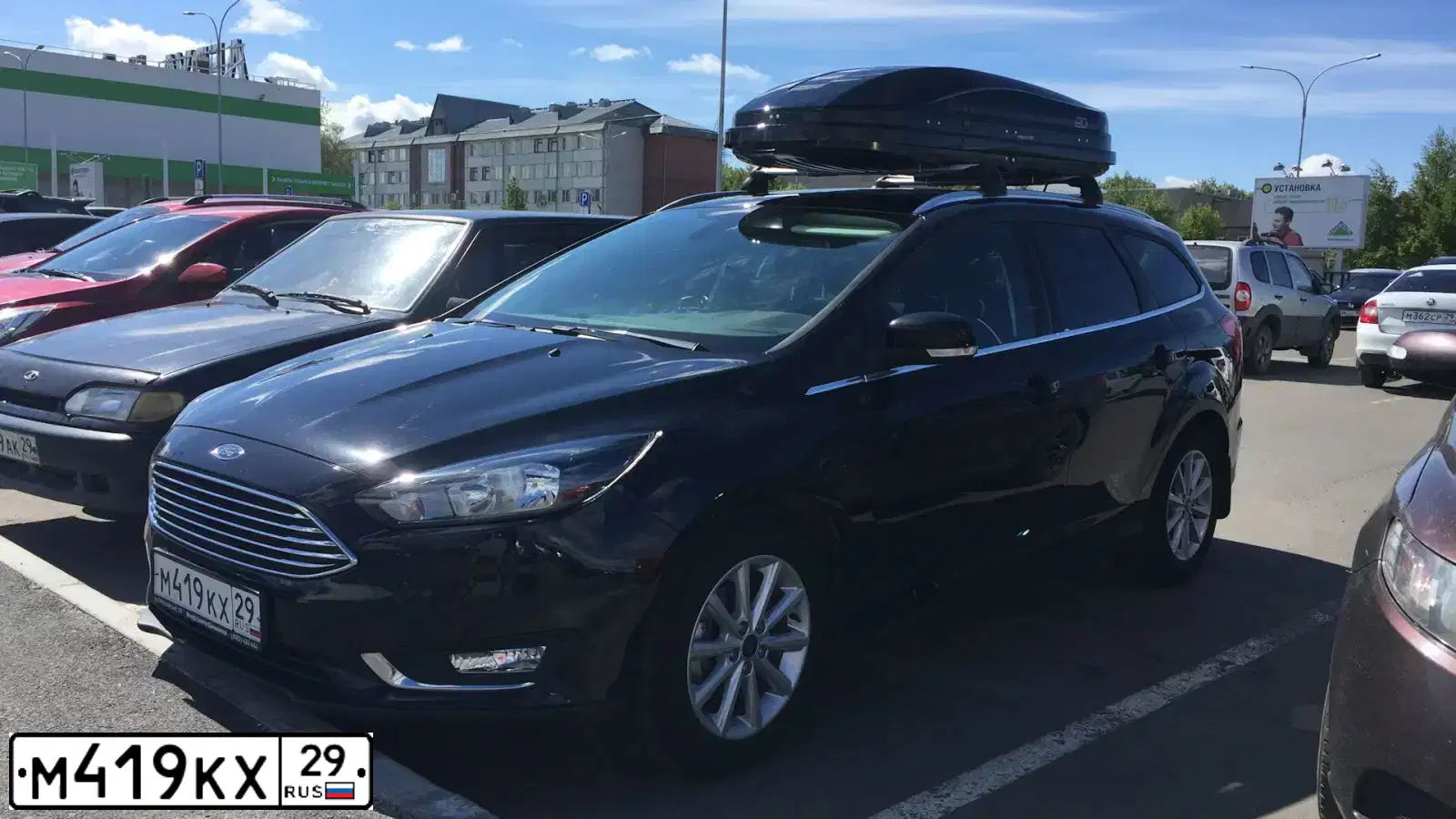 Фото автомобиля FORD FOCUS, 2017 — госномер М419КХ29. Цвет: ЧЕРНЫЙ