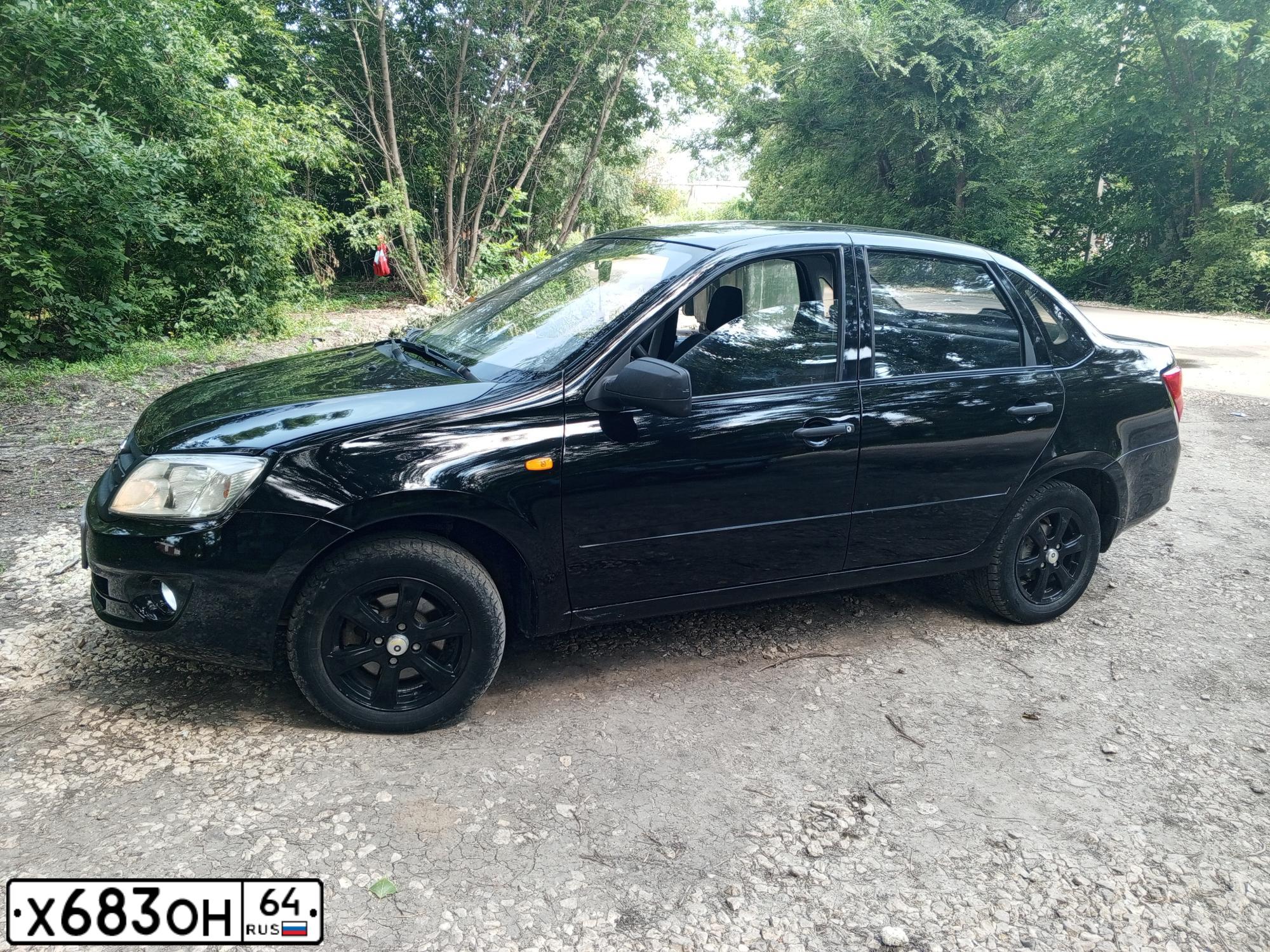 Фото автомобиля LADA 2190 GRANTA, 2012 — госномер Х683ОН64. Цвет: ЧЕРНЫЙ