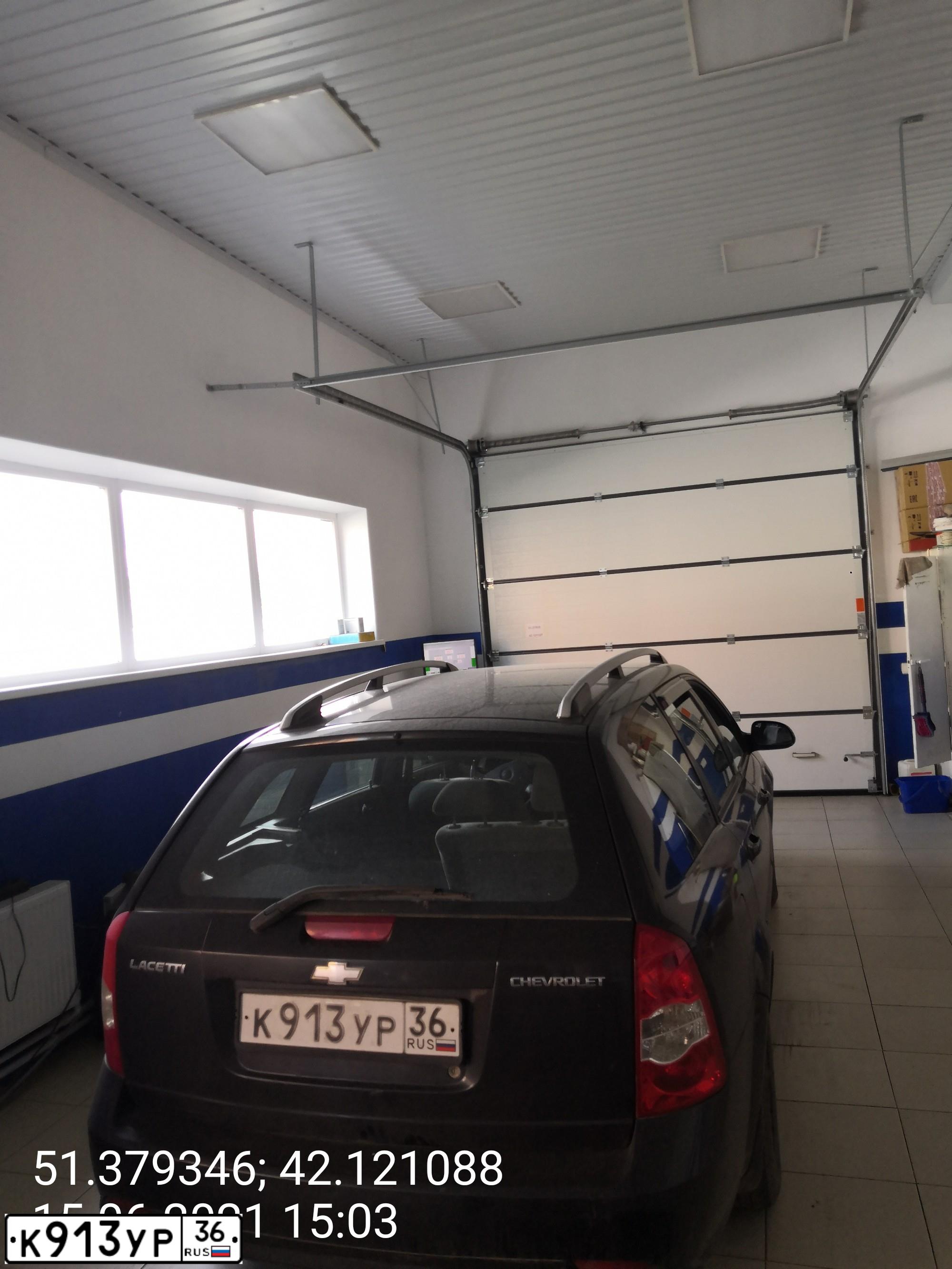 Фото автомобиля CHEVROLET LACETTI, 2006 — госномер К913УР36. Цвет: ЧЕРНЫЙ