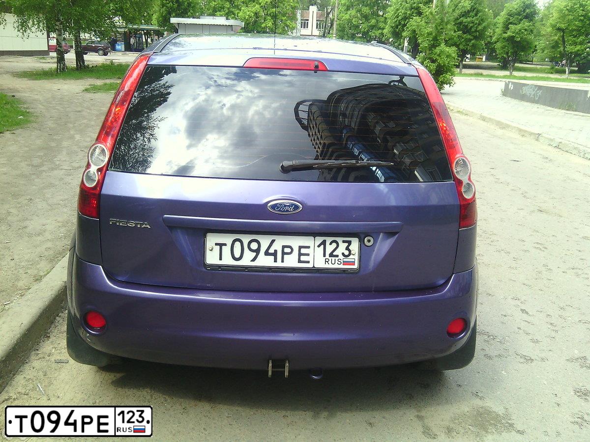 Фото автомобиля FORD FIESTA / ASPIRE, 2006 — госномер Т094РЕ123. Цвет: СИРЕНЕВЫЙ