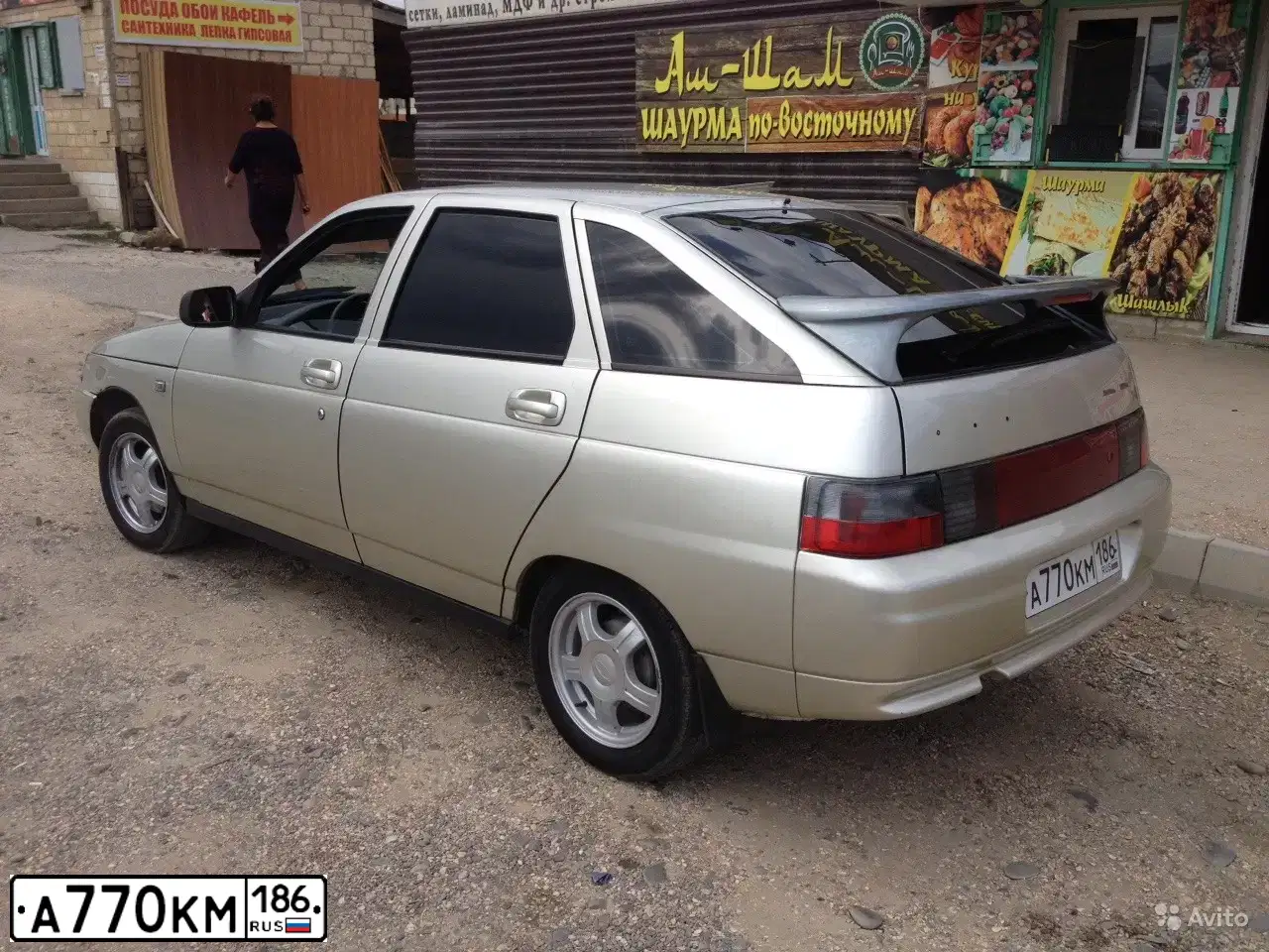 Фото автомобиля LADA 2112, 2006 — госномер А770КМ186. Цвет: СЕРЕБРИСТО-БЕЖЕВЫЙ