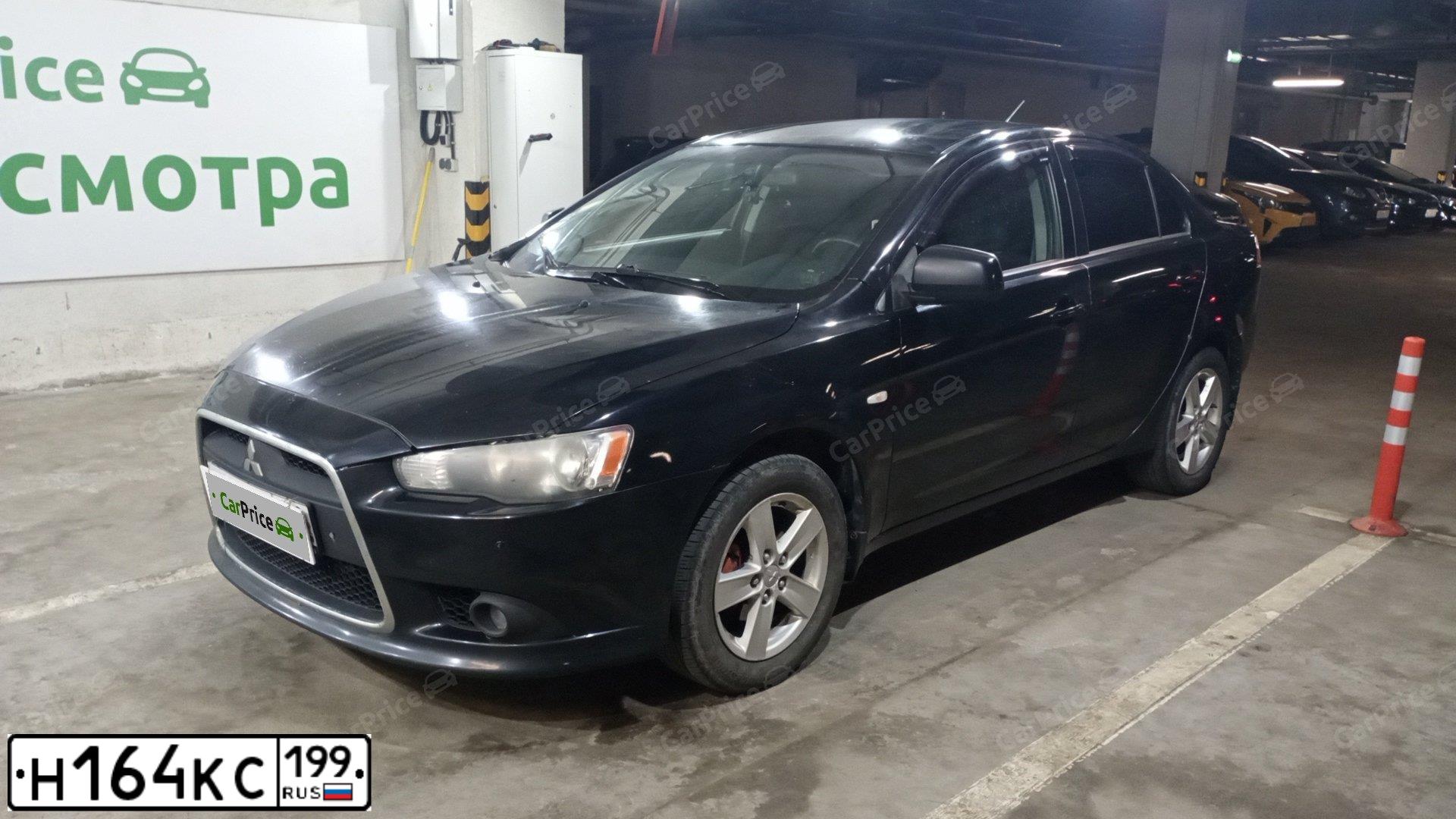 Фото автомобиля MITSUBISHI LANCER, 2008 — госномер Н164КС199. Цвет: ЧЕРНЫЙ