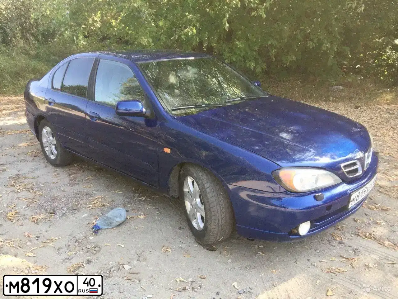 Фото автомобиля NISSAN PRIMERA, 1999 — госномер Н042ОР32. Цвет: синий