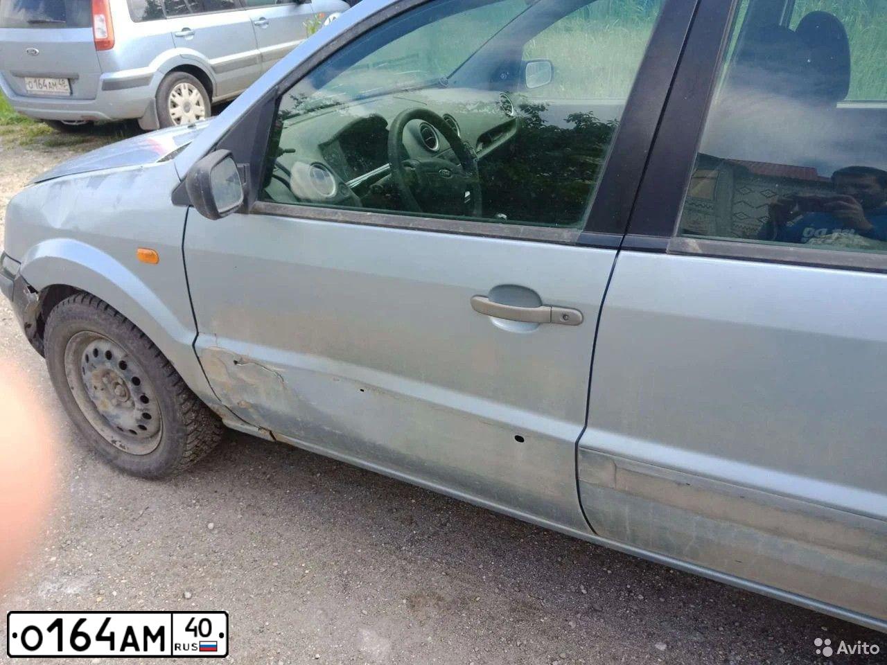 Фото автомобиля GEELY EMGRAND, 2014 — госномер О164АМ40. Цвет: СТАЛЬНОЙ (СЕРЫЙ)