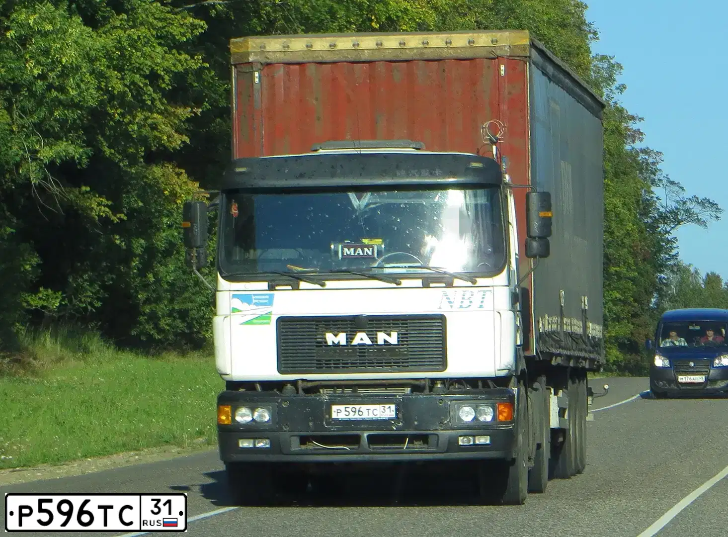Фото автомобиля MAN 19.000-SERIE, 1998 — госномер Р596ТС31. Цвет: БЕЛЫЙ