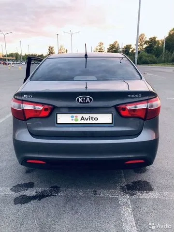 Фото автомобиля KIA RIO, 2013 — госномер К272ОВ21. Цвет: Серый