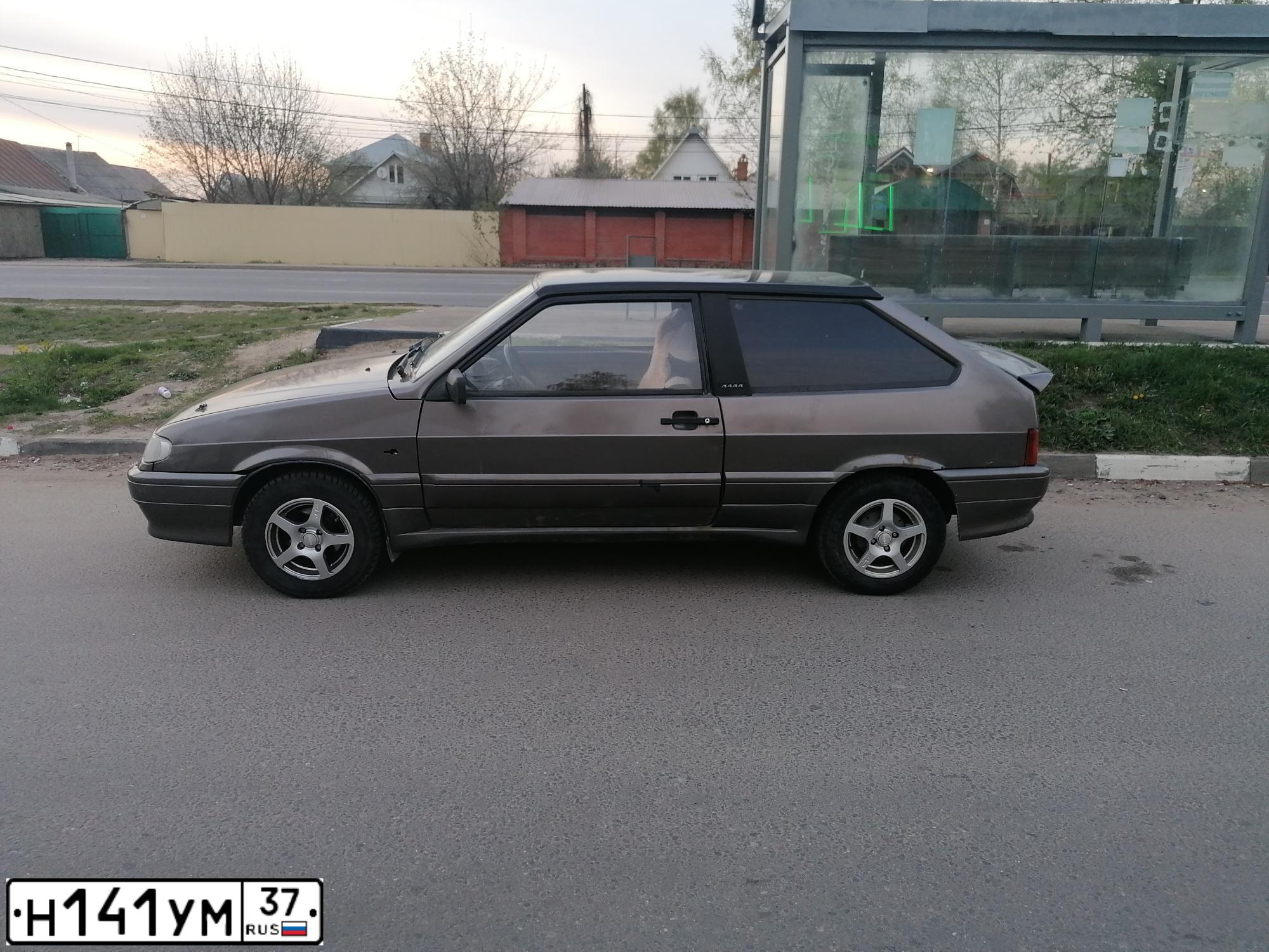 Фото автомобиля LADA 2113 SAMARA, 2006 — госномер Н141УМ37. Цвет: СЕРО-ЗЕЛЕНЫЙ