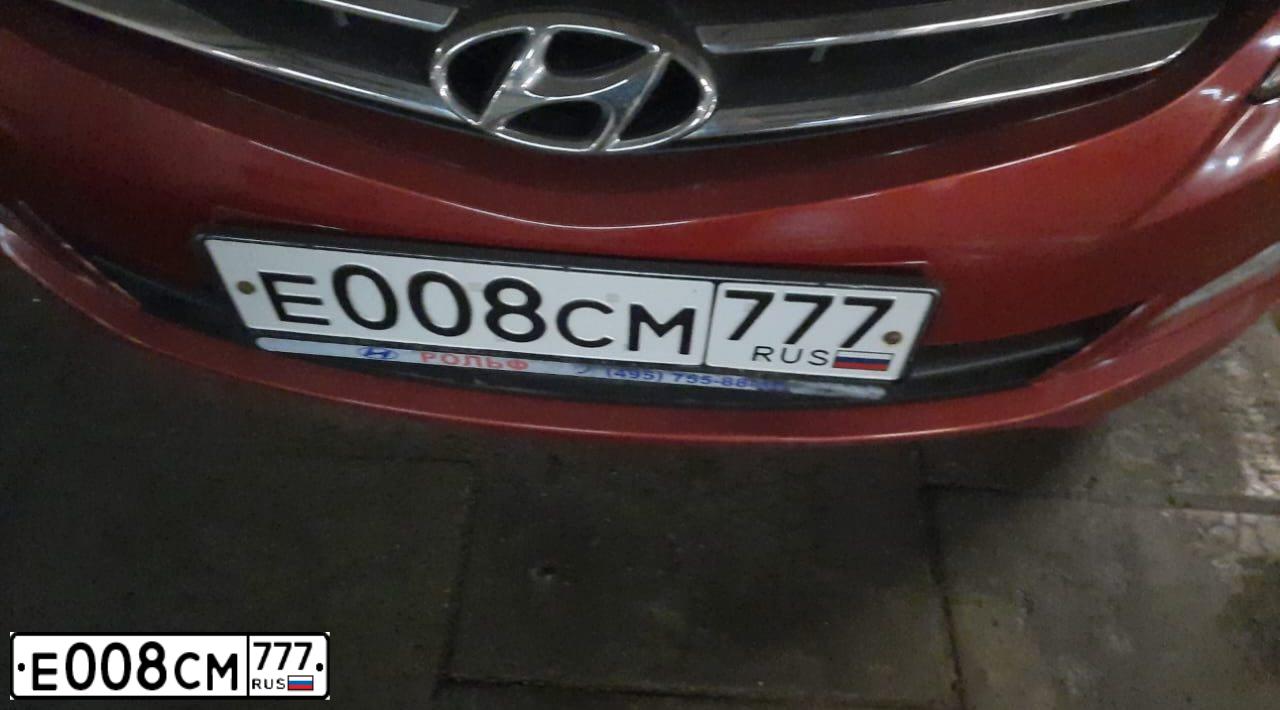 Фото автомобиля HYUNDAI SOLARIS, 2015 — госномер Е008СМ777. Цвет: КРАСНЫЙ ГРАНАТ
