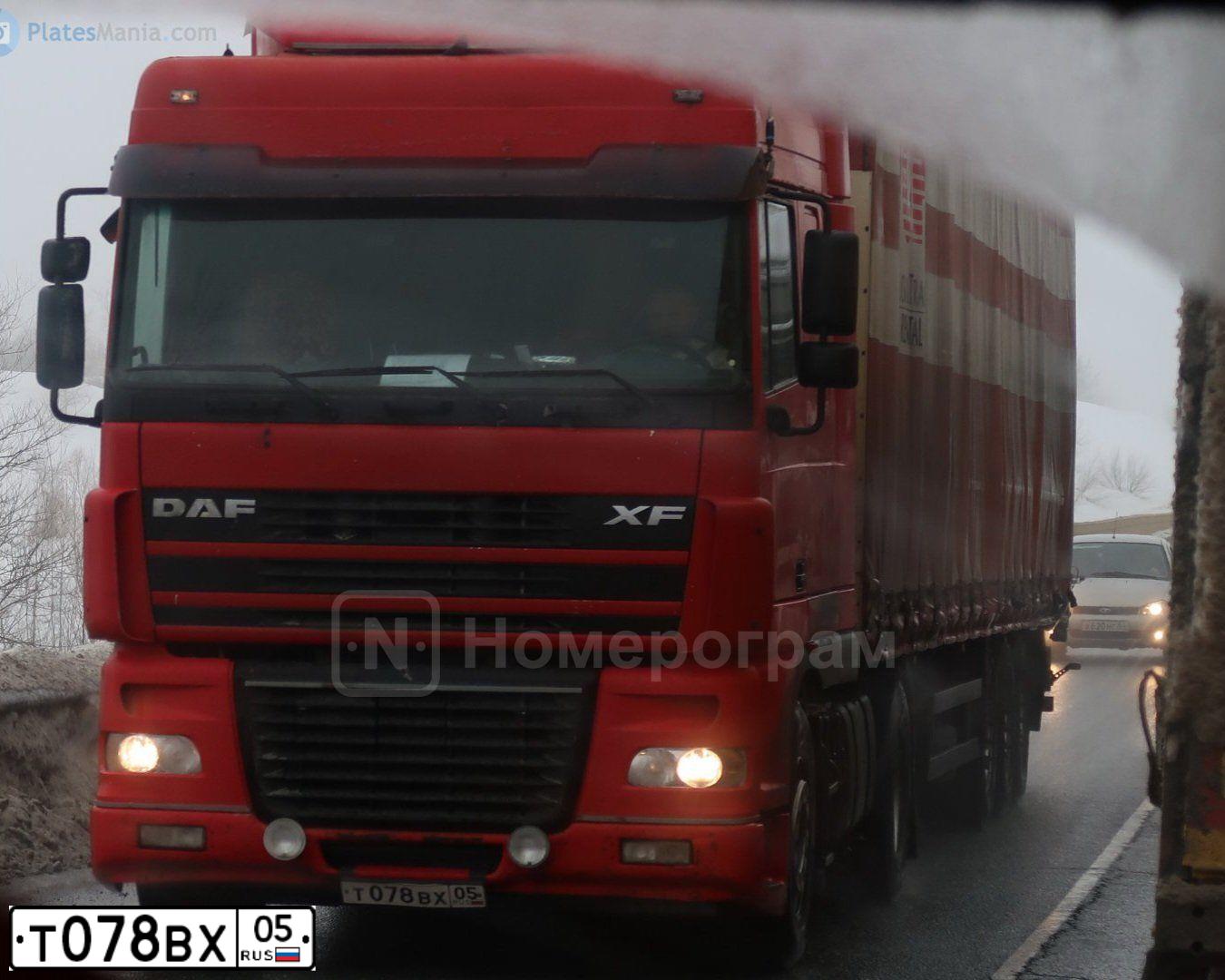 Фото автомобиля DAF XF 95 FT /4X2/, 2011 — госномер Т078ВХ05. Цвет: Красный