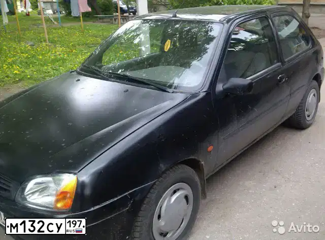 Фото автомобиля FORD FIESTA / ASPIRE, 1999 — госномер М132СУ197. Цвет: ЧЕРНЫЙ