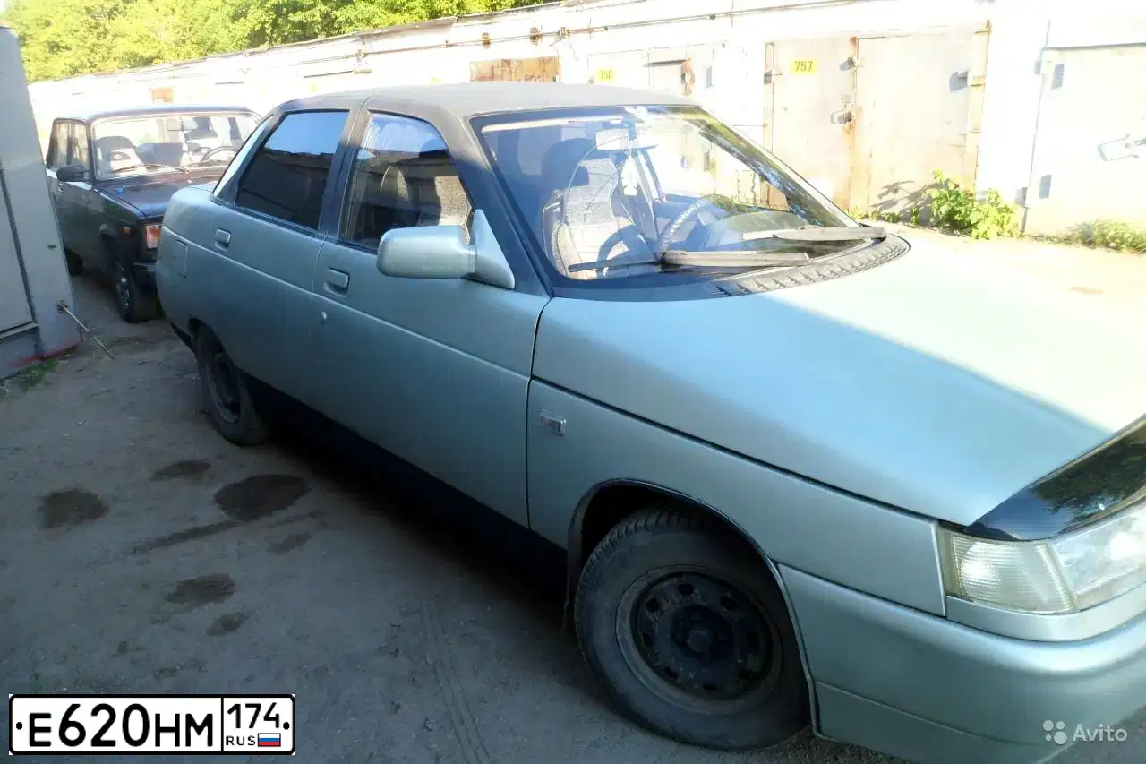 Фото автомобиля LADA 2110, 2002 — госномер Т299НС74. Цвет: ЖЕЛТО-ЗЕЛЕНЫЙ