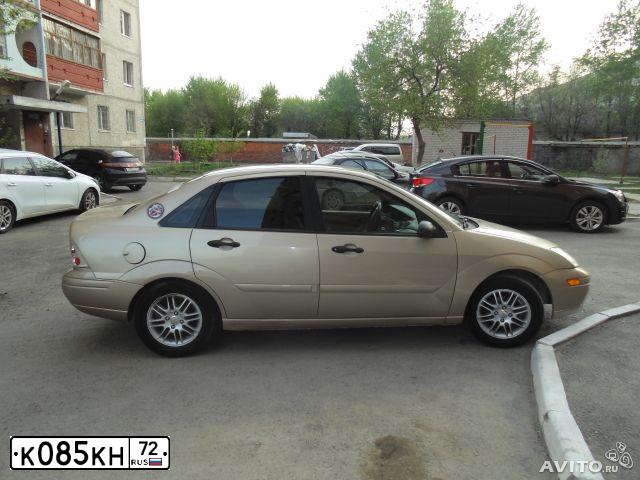 Фото автомобиля FORD D FOCUS, 2000 — госномер К085КН72. Цвет: ЗОЛОТИСТЫЙ