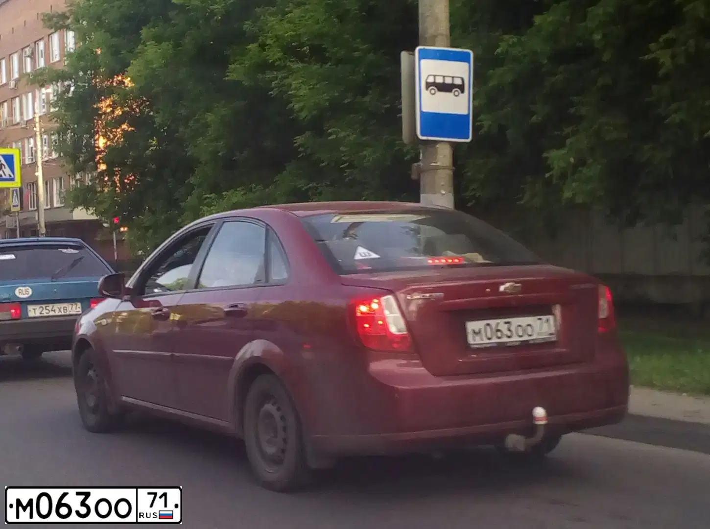 Фото автомобиля CHEVROLET LACETTI, 2011 — госномер М063ОО71. Цвет: Красный
