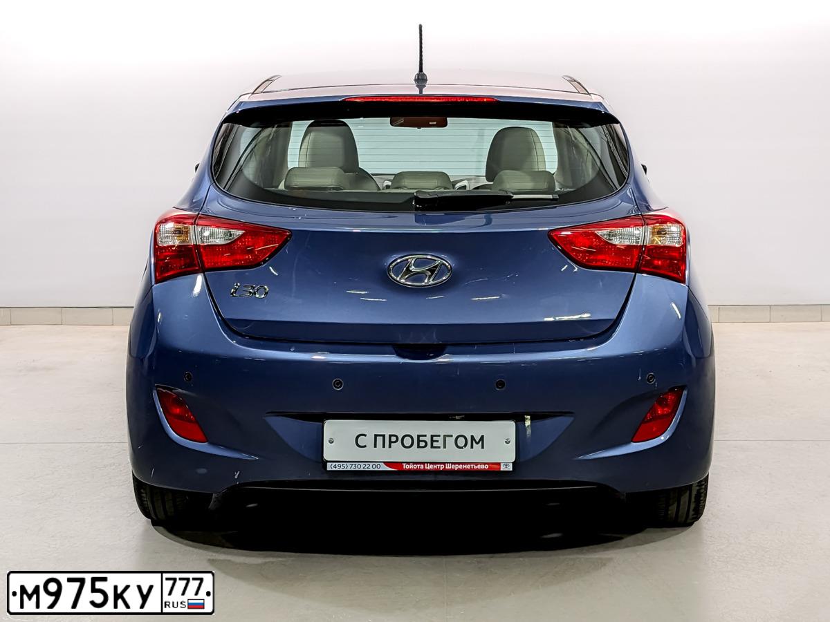 Фото автомобиля ХЕНДЭ I30, 2014 — госномер Е409РО797. Цвет: синий
