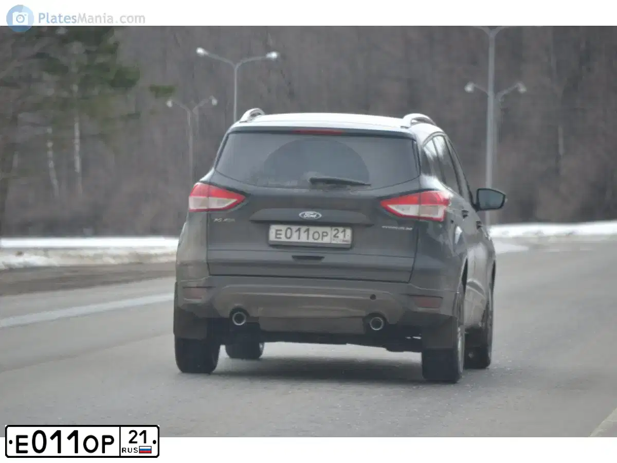 Фото автомобиля FORD KUGA, 2015 — госномер Е011ОР21. Цвет: Черный