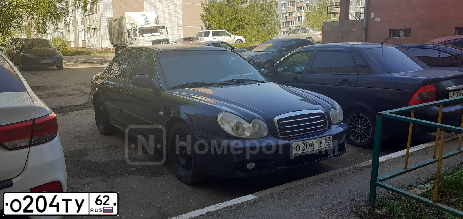 Фото автомобиля TAGAZ SONATA, 2006 — госномер О204ТУ62. Цвет: ЧЕРНЫЙ