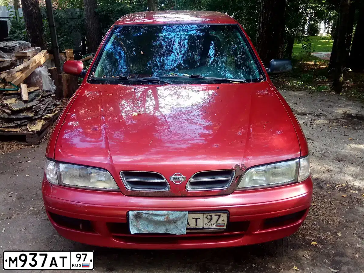 Фото автомобиля NISSAN PRIMERA, 1997 — госномер Х422НО193. Цвет: Красный (вишневый)