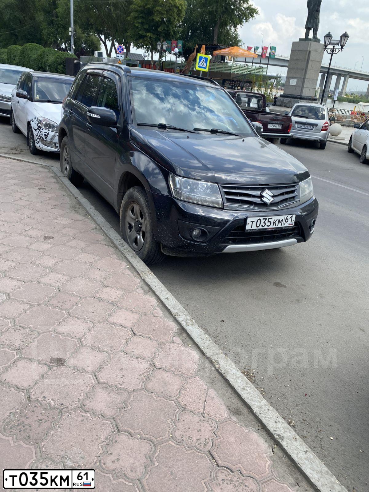 Фото автомобиля SUZUKI /GRAND/ VITARA, 2012 — госномер Т035КМ61. Цвет: ЧЕРНЫЙ