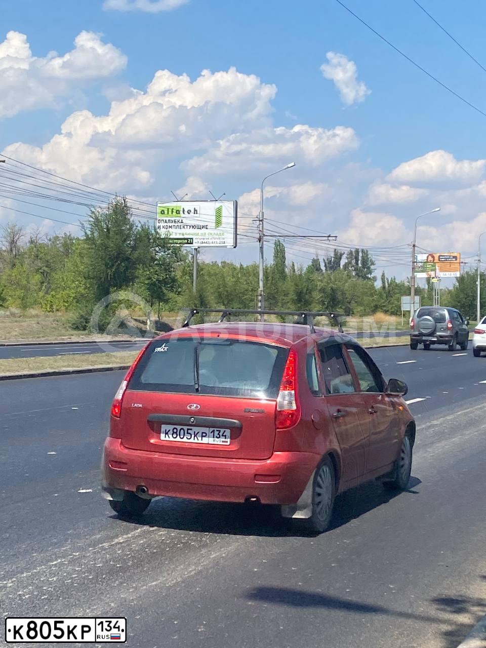 Фото автомобиля LADA 1119 KALINA, 2006 — госномер Х595ВС21. Цвет: СЕРЕБРИСТО-КРАСНЫЙ