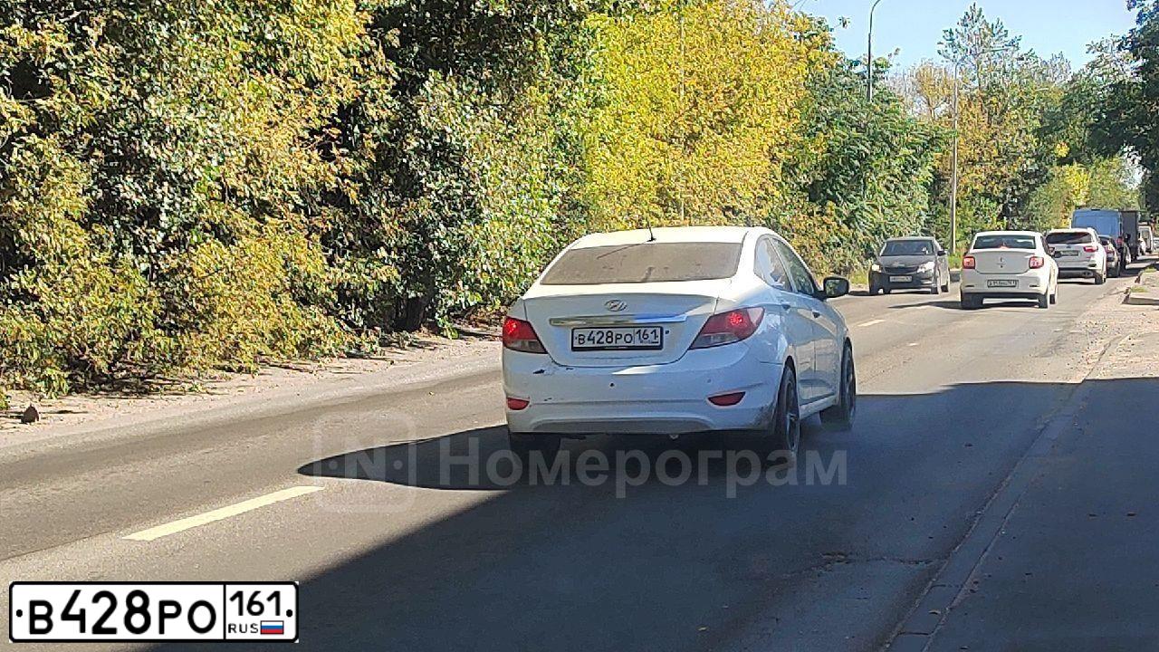 Фото автомобиля HYUNDAI SOLARIS, 2011 — госномер В428РО161. Цвет: БЕЛЫЙ