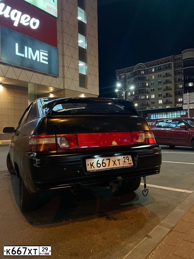 Фото автомобиля LADA 2112, 2008 — госномер К667ХТ29. Цвет: Сине-Черный