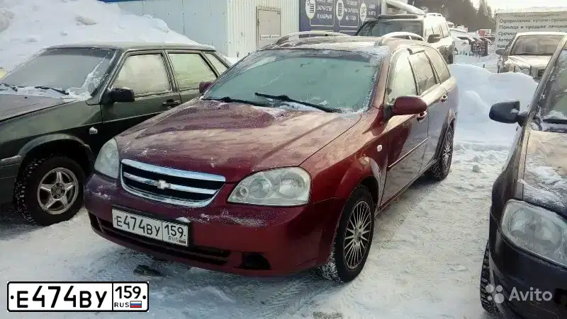 Фото автомобиля CHEVROLET LACETTI, 2007 — госномер Е474ВУ159. Цвет: ТЕМНО-КРАСНЫЙ