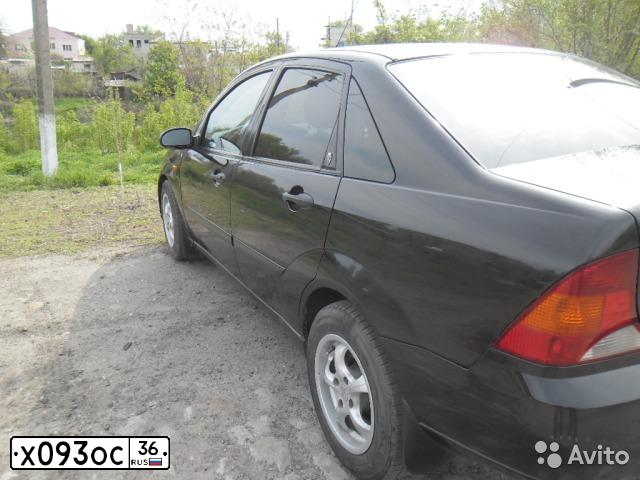 Фото автомобиля FORD FOCUS, 2001 — госномер Х093ОС36. Цвет: ЧЕРНЫЙ