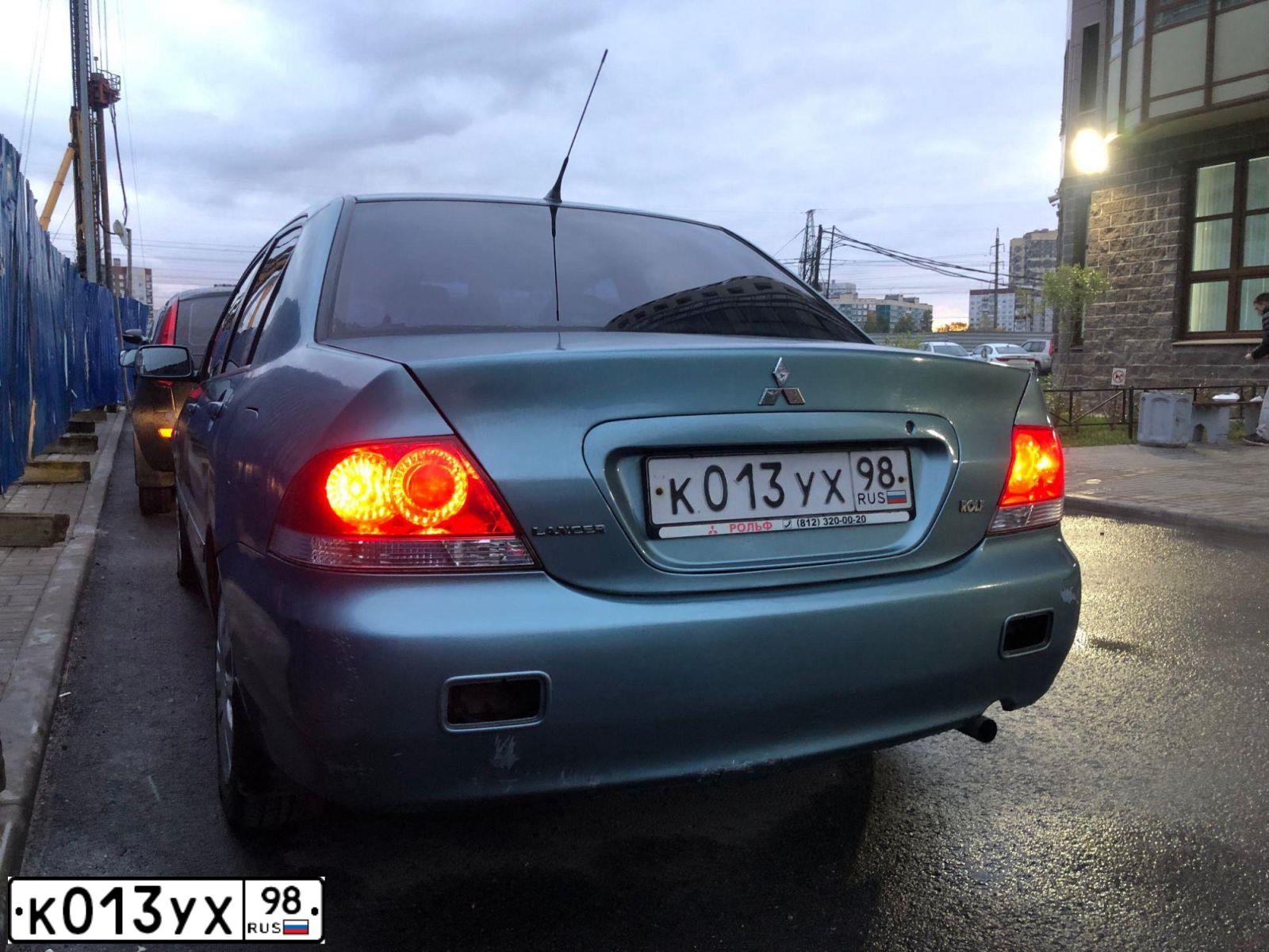 Фото автомобиля MITSUBISHI LANCER, 2006 — госномер К837ОВ53. Цвет: СВЕТЛО-СЕРО-ЗЕЛЕНЫЙ