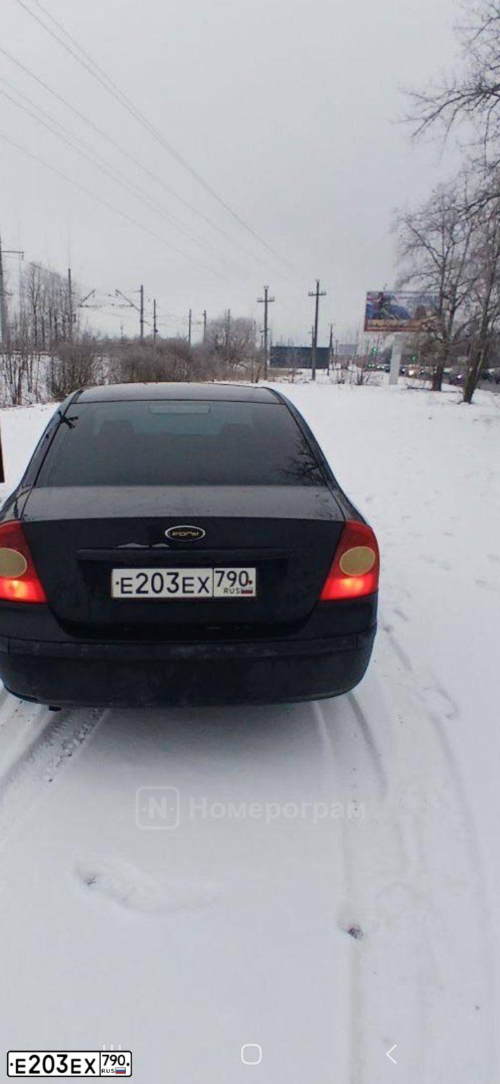 Фото автомобиля FORD FOCUS, 2007 — госномер Т576ОМ799. Цвет: ЧЕРНЫЙ
