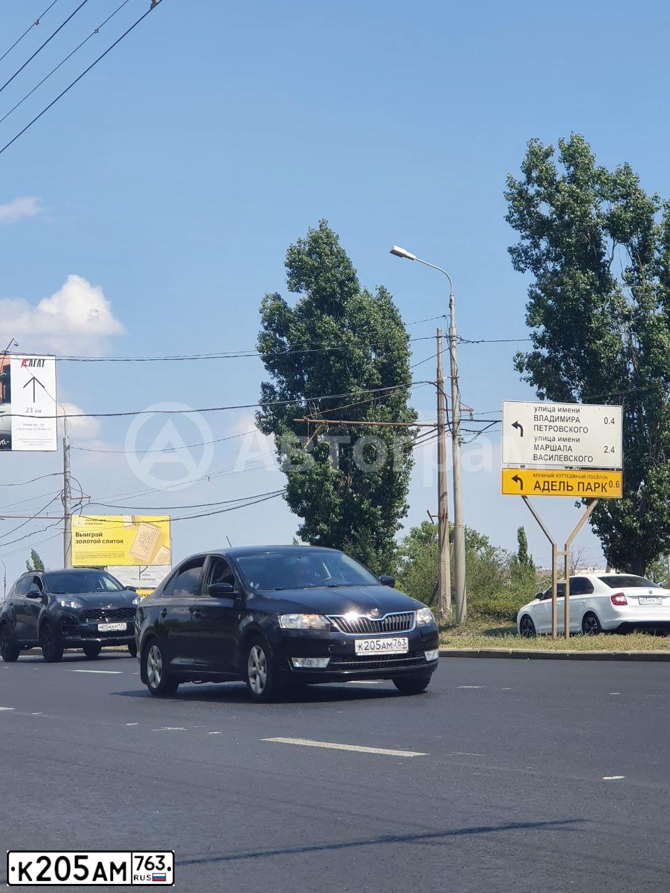 Фото автомобиля SKODA RAPID, 2015 — госномер К205АМ763. Цвет: ЧЕРНЫЙ