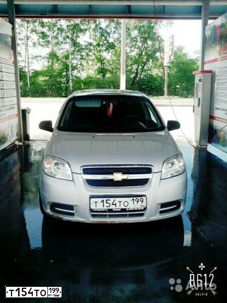 Фото автомобиля CHEVROLET AVEO, 2009 — госномер Х414СВ71. Цвет: Серебристый