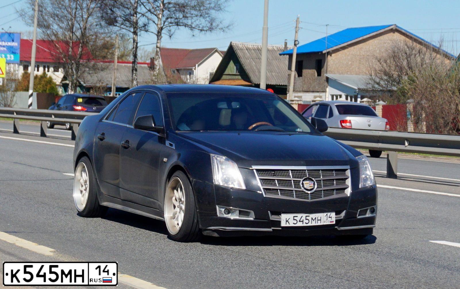 Фото автомобиля CADILLAC CTS, 2011 — госномер Е249НТ797. Цвет: ЧЕРНЫЙ