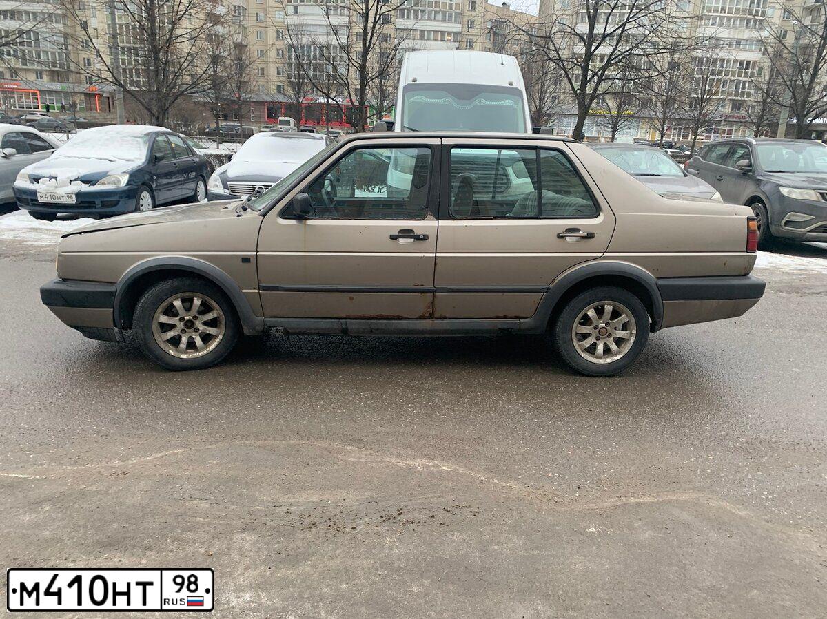 Фото автомобиля MITSUBISHI LANCER, 2006 — госномер М410НТ98. Цвет: СИНИЙ