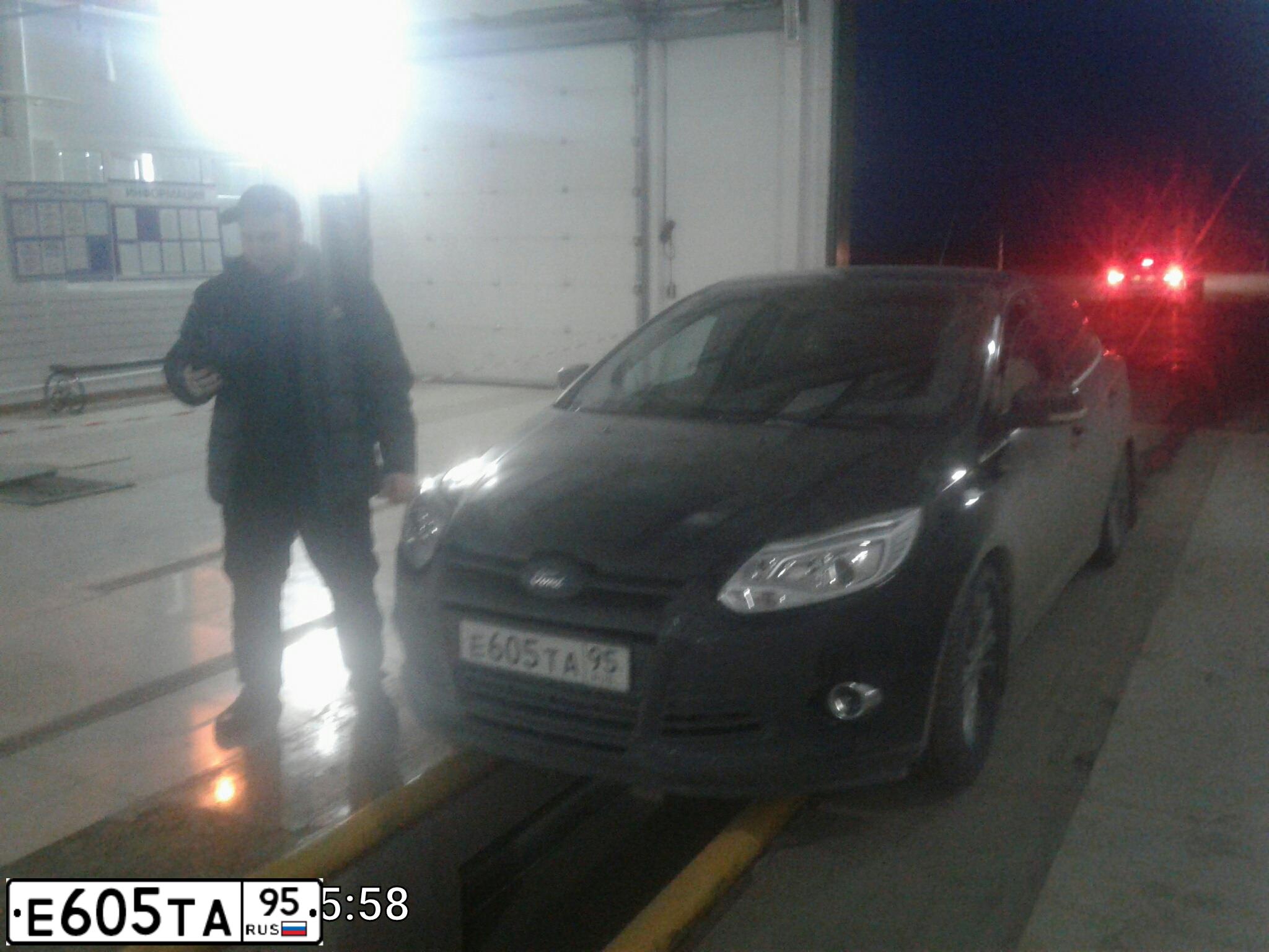 Фото автомобиля FORD D FOCUS, 2012 — госномер Х401ТР750. Цвет: ЧЕРНЫЙ