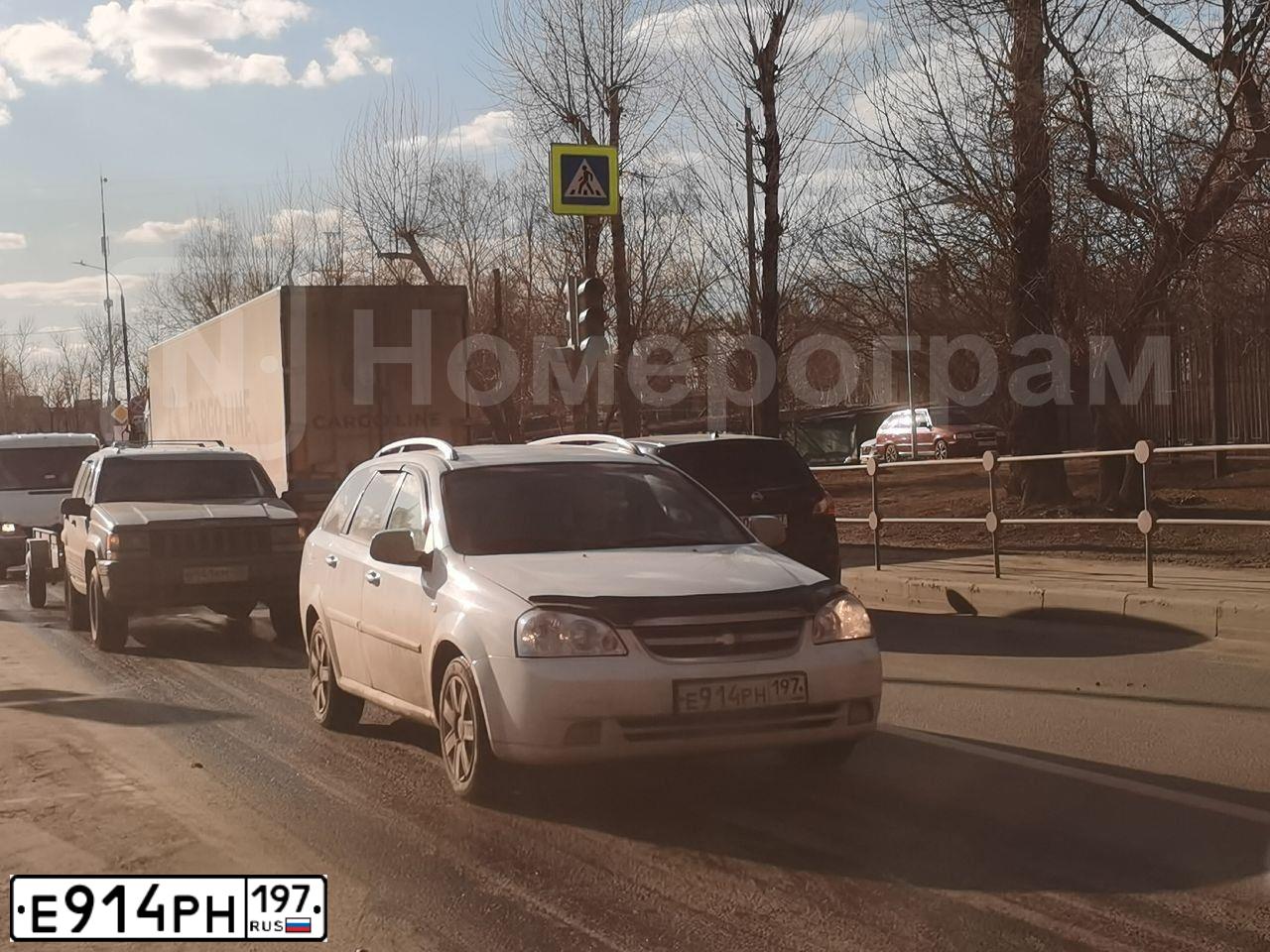 Фото автомобиля CHEVROLET LACETTI, 2011 — госномер Н827ЕВ797. Цвет: Белый