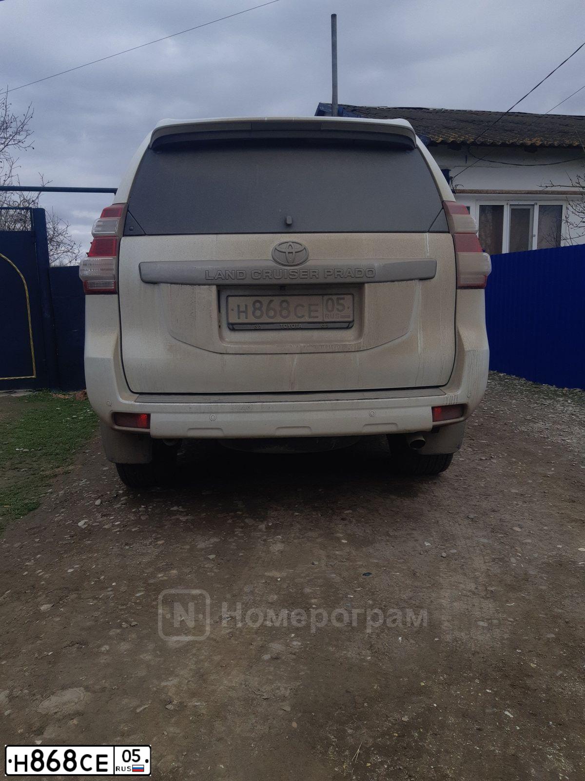 Фото автомобиля TOYOTA CAMRY, 2015 — госномер Х922ОР05. Цвет: Белый