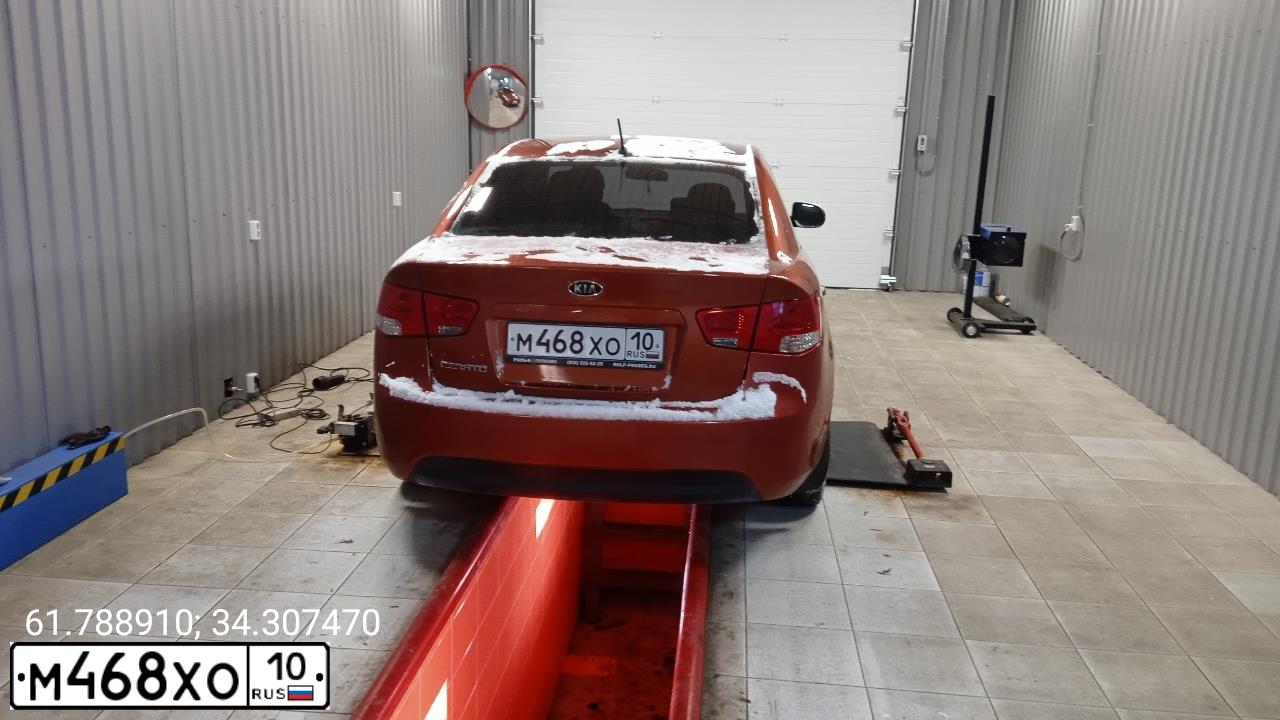Фото автомобиля KIA CERATO, 2011 — госномер О276АО98. Цвет: Оранжевый