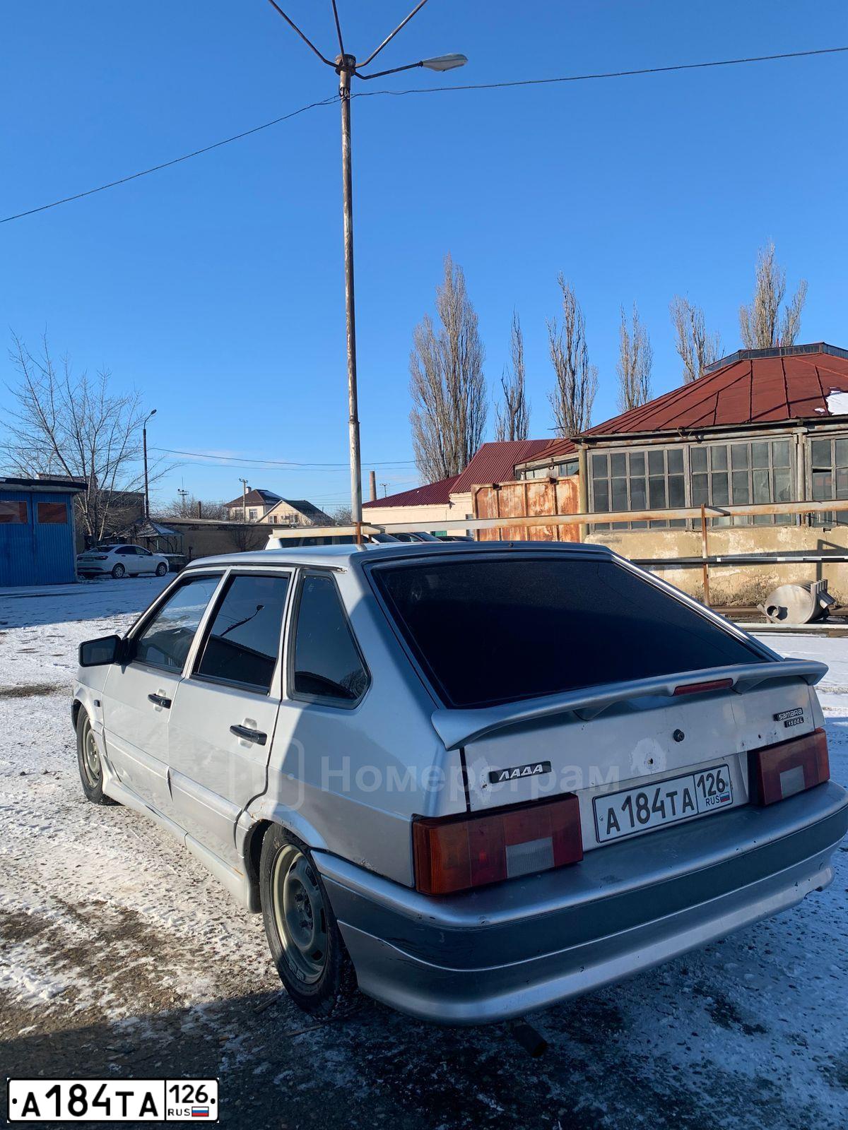 Фото автомобиля LADA 2114 SAMARA, 2004 — госномер А184ТА126. Цвет: СВЕТЛО-СЕРЕБРИСТЫЙ МЕТАЛЛ