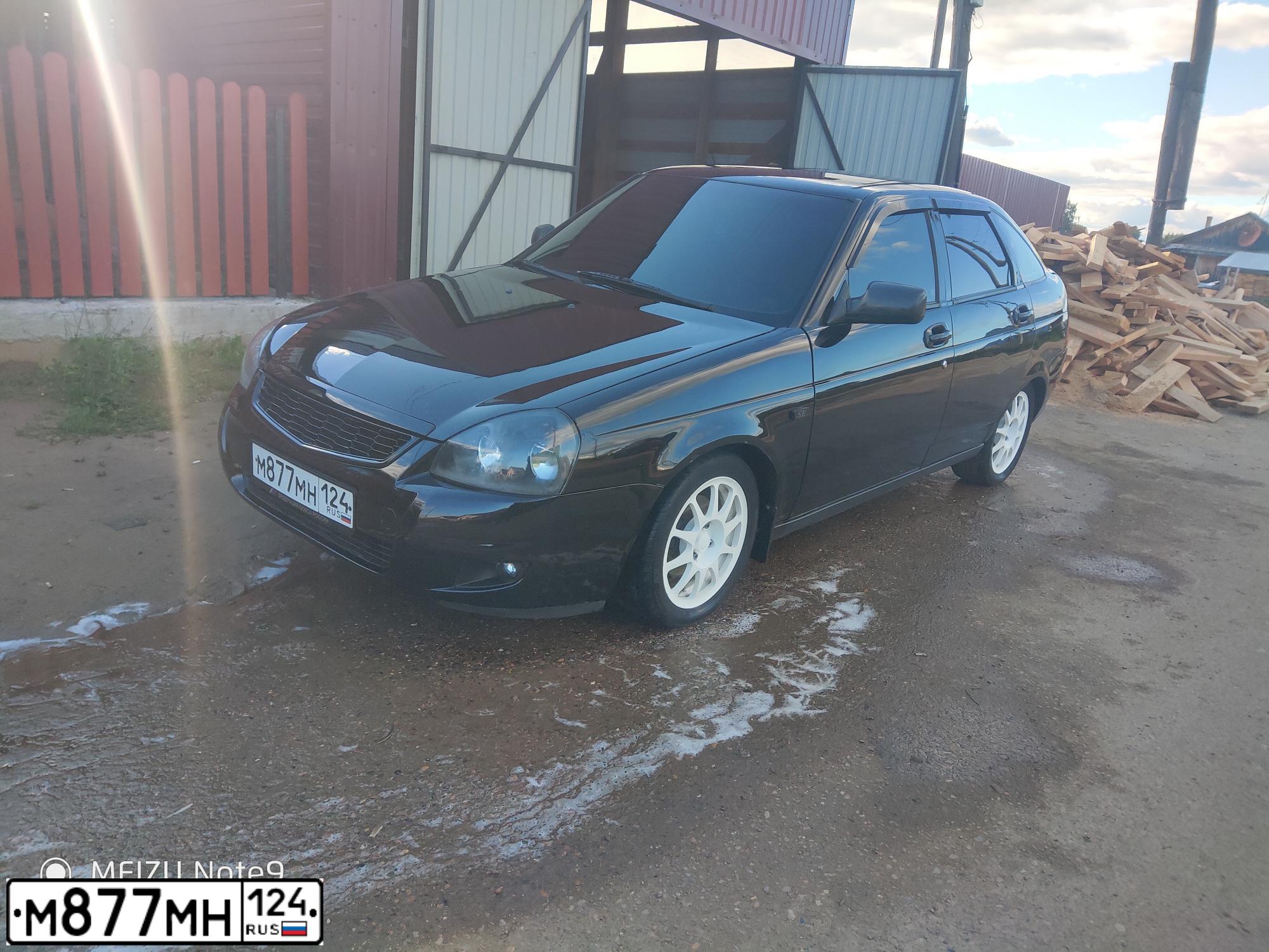 Фото автомобиля LADA 2172 PRIORA, 2009 — госномер М877МН124. Цвет: СИНЕ-ЧЕРНЫЙ