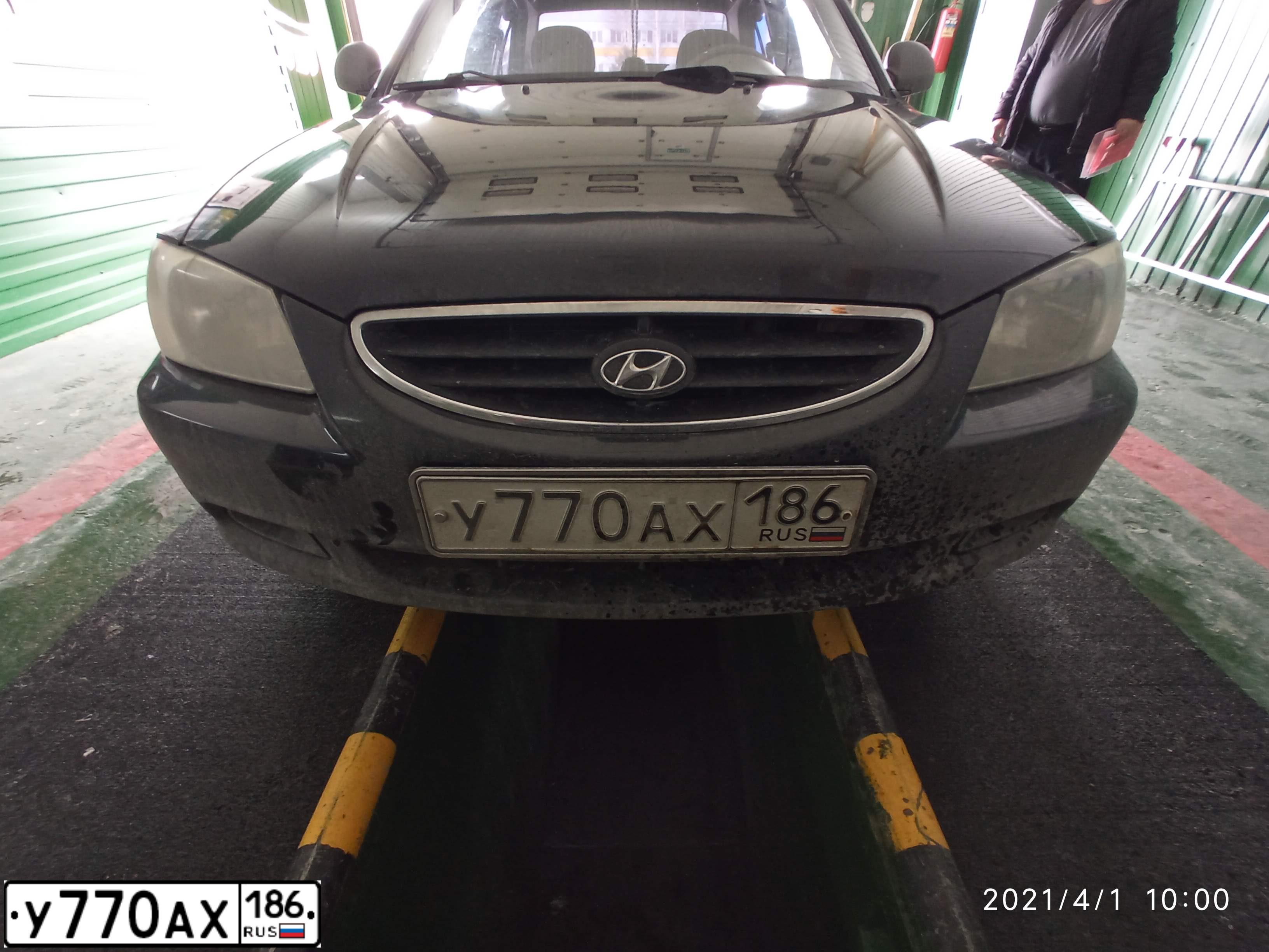 Фото автомобиля TAGAZ ACCENT, 2009 — госномер У770АХ186. Цвет: ЧЕРНЫЙ