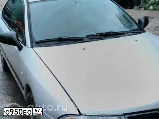 Фото автомобиля MITSUBISHI CARISMA, 2000 — госномер С318МА40. Цвет: Серебристый