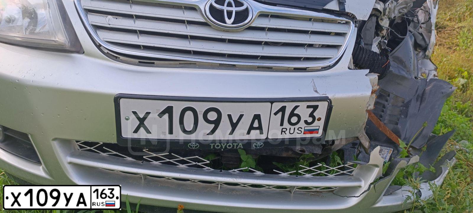 Фото автомобиля TOYOTA COROLLA, 2004 — госномер Н002ЕТ63. Цвет: Серебристый