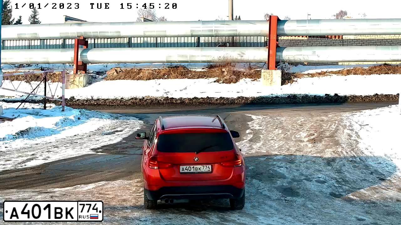 Фото автомобиля BMW X1, 2012 — госномер А401ВК774. Цвет: Оранжевый