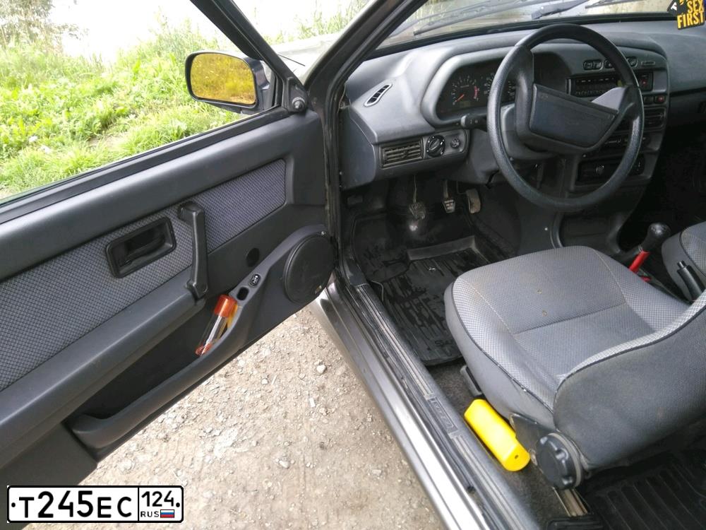 Фото автомобиля LADA 2113 SAMARA, 2008 — госномер Т109ЕК138. Цвет: серебристо-коричневый