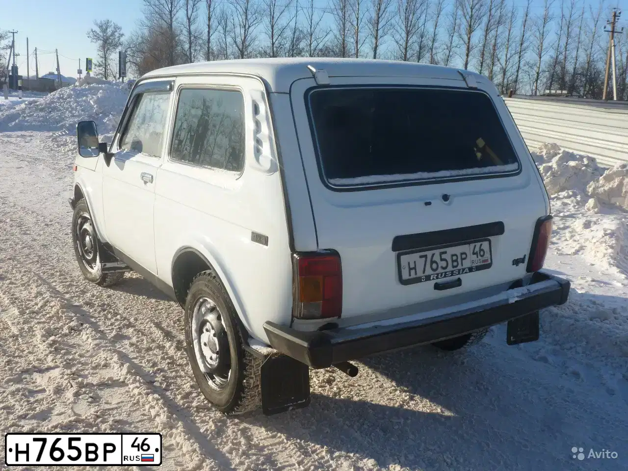 Фото автомобиля LADA 2121 NIVA, 1998 — госномер Е919ВХ36. Цвет: БЕЛО-ЖЕЛТЫЙ