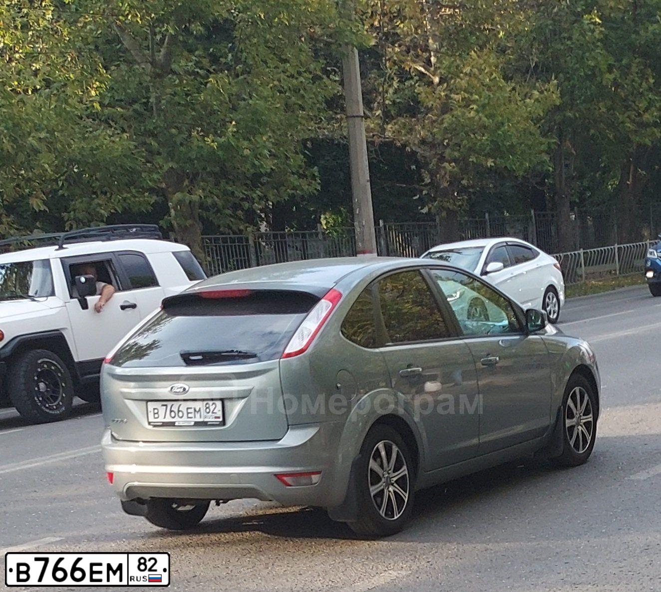 Фото автомобиля FORD FOCUS, 2010 — госномер В766ЕМ82. Цвет: Серый