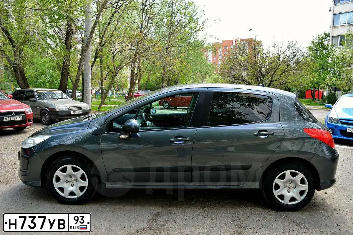 Фото автомобиля MITSUBISHI LANCER, 2010 — госномер Н737УВ93. Цвет: КРАСНЫЙ